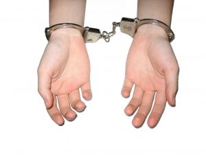Handcuffed hands.jpg