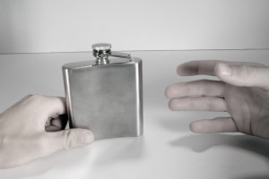 handing a flask Charlotte Criminal Lawyer Mecklenburg DWI Attorney