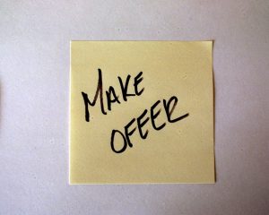 post-it-note-make-offer-Charlotte-Monroe-Mooresville-Plea-deal-criminal-lawyer-300x240