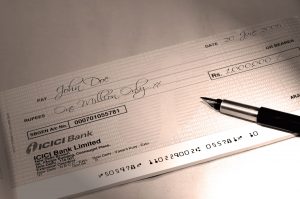 million-buck-check-Charlotte-Monroe-Mooresville-Bail-Bond-300x199